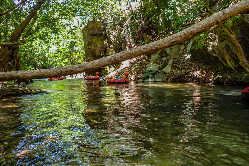people in tires on the river in nobres